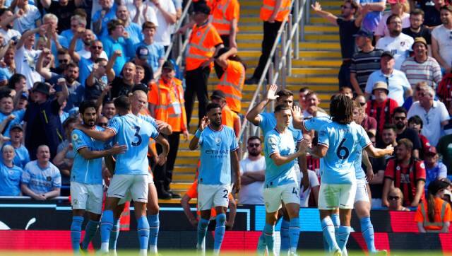 Manchester City’s Ilkay Gundogan celebrates with teammates after scoring his side’s opening goal during the English Premier League soccer match between Manchester City and Bournemouth at Etihad stadium in Manchester, England, Saturday. AP