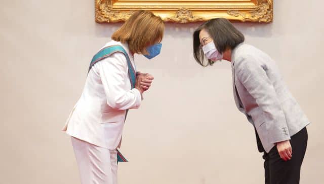 In this photo released by the Taiwan Presidential Office, U.S. House Speaker Nancy Pelosi, left, and Taiwanese President President Tsai Ing-wen gesture during a meeting in Taipei, Taiwan, Wednesday, Aug. 3, 2022. U.S. House Speaker Nancy Pelosi, meeting top officials in Taiwan despite warnings from China, said Wednesday that she and other congressional leaders in a visiting delegation are showing they will not abandon their commitment to the self-governing island. (Taiwan Presidential Office via AP)