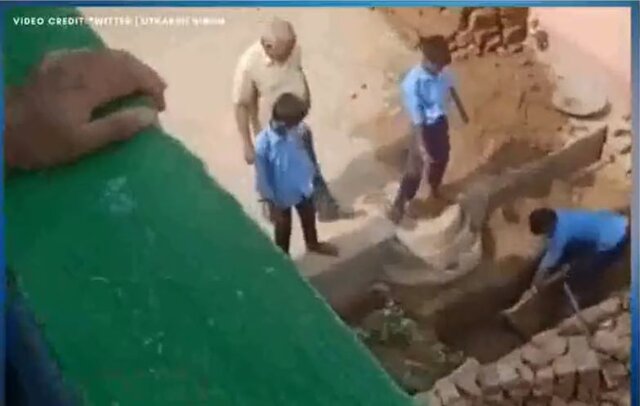 Watch: Bihar government school students chop wood, cut stones; disciplinary action taken Watch: Bihar government school students chop wood, cut stones; disciplinary action taken
