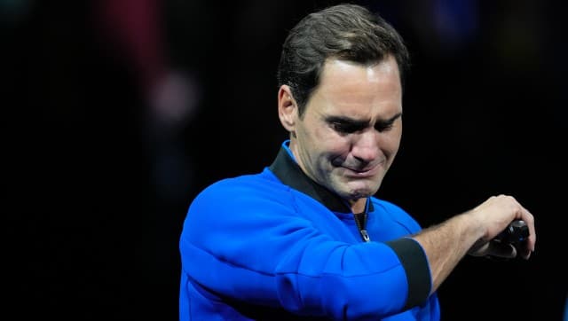 An emotional Roger Federer of Team Europe is interviewed after playing with Rafael Nadal in a Laver Cup doubles match against Team World’s Jack Sock and Frances Tiafoe at the O2 arena in London, Friday, Sept. 23, 2022. Federer’s losing doubles match with Nadal marked the end of an illustrious career that included 20 Grand Slam titles and a role as a statesman for tennis. (AP Photo/Kin Cheung)