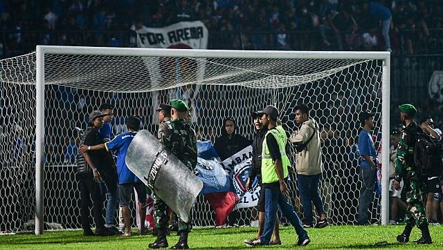 Indonesia football stadium disaster: Police to charge 6 people for tragedy Indonesia football stadium disaster: Police to charge 6 people for tragedy