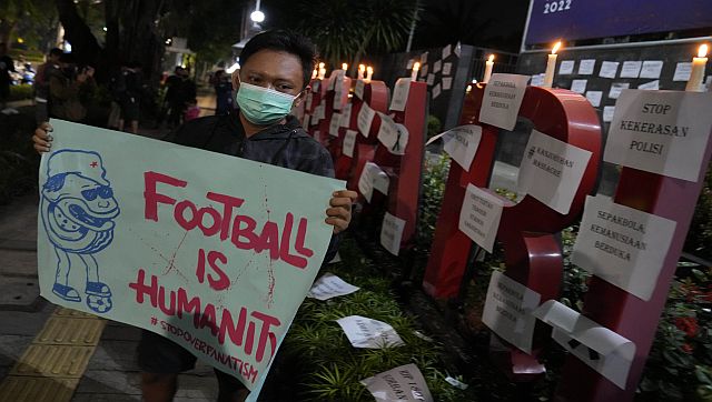 Explained The stadium stampede exposes troubled history of football in Indonesia