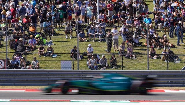 Fans attend a practice session for the Formula One U.S. Grand Prix auto race at Circuit of the Americas, Friday, Oct. 21, 2022, in Austin, Texas. (AP Photo/Charlie Neibergall)