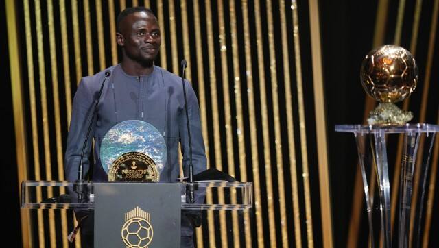 Bayern Munich's Sadio Mane speaks after winning the Socrates Award during the 66th Ballon d'Or ceremony at Theatre du Chatelet in Paris, France, Monday, Oct. 17, 2022. (AP Photo/Francois Mori)