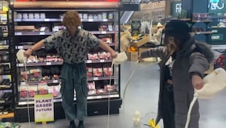 Anti-dairy activists vandalise milk aisle in a store even as kids going hungry in UK. Anti-dairy activists vandalise milk aisle in a store even as kids going hungry in UK.