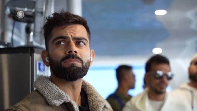 Virat Kohli looks on while the team was on their way to the island,. The trip came a day ahead of India's second warm up game against Western Australia in Perth. BCCI