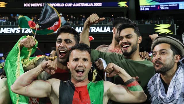 Afghanistan fans react during the T20 World Cup cricket match between Australia and Afghanistan in Adelaide, Australia, Friday, Nov. 4, 2022. (AP Photo/James Elsby)