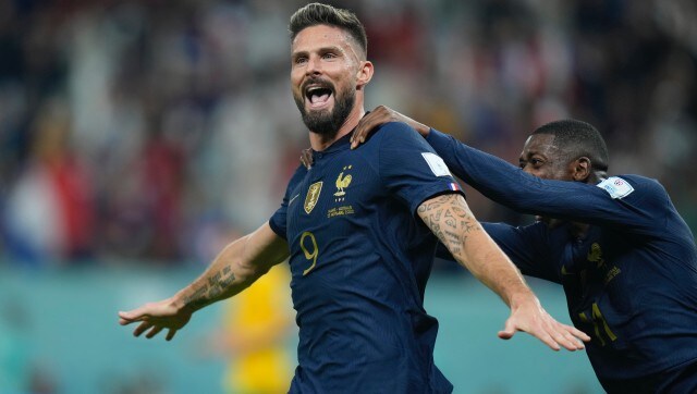 France's Olivier Giroud, left, celebrates with his teammate Ousmane Dembele after scoring his side's second goal during the World Cup group D soccer match between France and Australia, at the Al Janoub Stadium in Al Wakrah, Qatar, Tuesday, Nov. 22, 2022. (AP Photo/Francisco Seco)