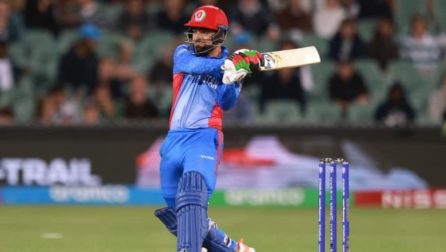 Afghanistan's Rashid Khan bats during the T20 World Cup cricket match between Australia and Afghanistan in Adelaide, Australia, Friday, Nov. 4, 2022. (AP Photo/James Elsby)