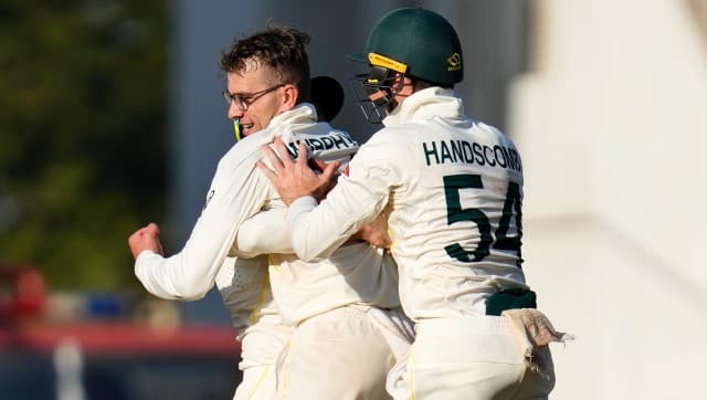 Australia’s Todd Murphy, left, celebrates with teammates after the dismissal of India’s KL Rahul during the first day of the first cricket test match between India and Australia in Nagpur, India, Thursday, Feb. 9, 2023. (AP Photo/Rafiq Maqbool)