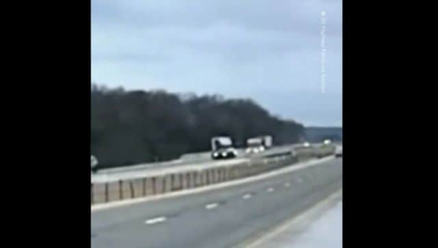 Watch: Semi truck spins out of control on icy Oklahoma freeway and crashes into cable barrier