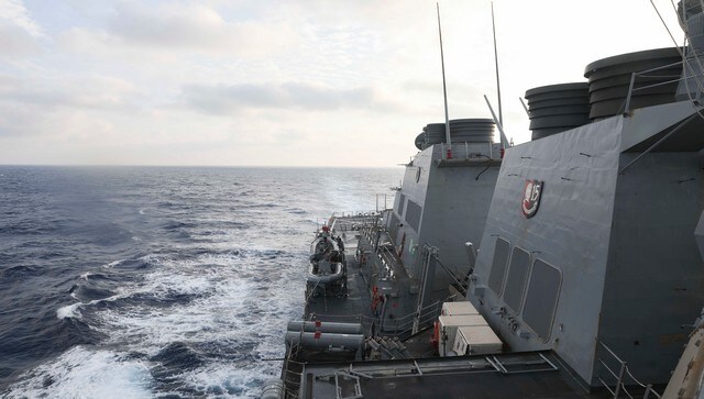 China threatens consequences over US warship's actions China threatens consequences over US warship's actions
