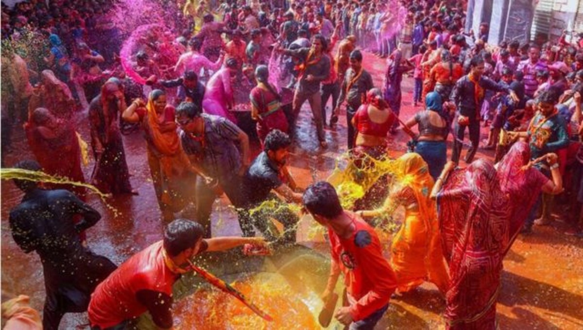 Why is Holi called the festival of colours and what do yellow