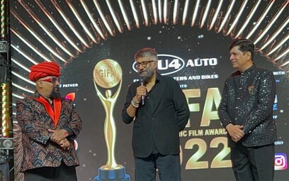 Vivek Ranjan Agnihotri gets awarded with 'GIFA Golden Awards' by Gujarat CM  Bhupendrabhai Patel - Photos News , Firstpost