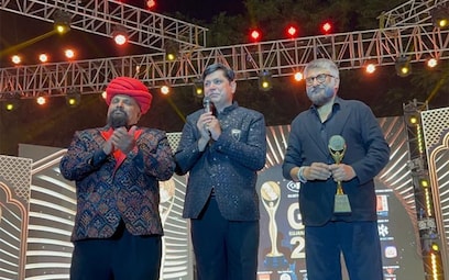 Vivek Ranjan Agnihotri gets awarded with 'GIFA Golden Awards' by Gujarat CM Bhupendrabhai Patel - Photos News , Firstpost