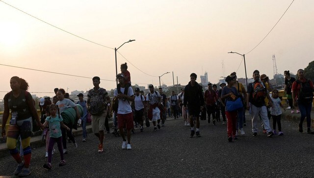 Thousands of migrants head for Mexico city, demand legal route to US