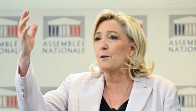 Le Pen tops French presidential poll as Macron pushes deeply unpopular reforms
