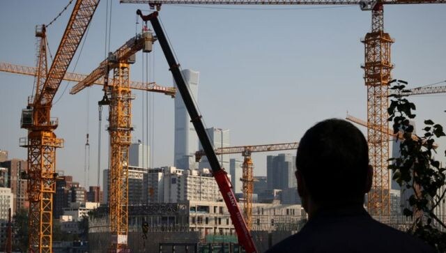 China's central bank cuts benchmark interest rates to boost economy China's central bank cuts benchmark interest rates to boost economy