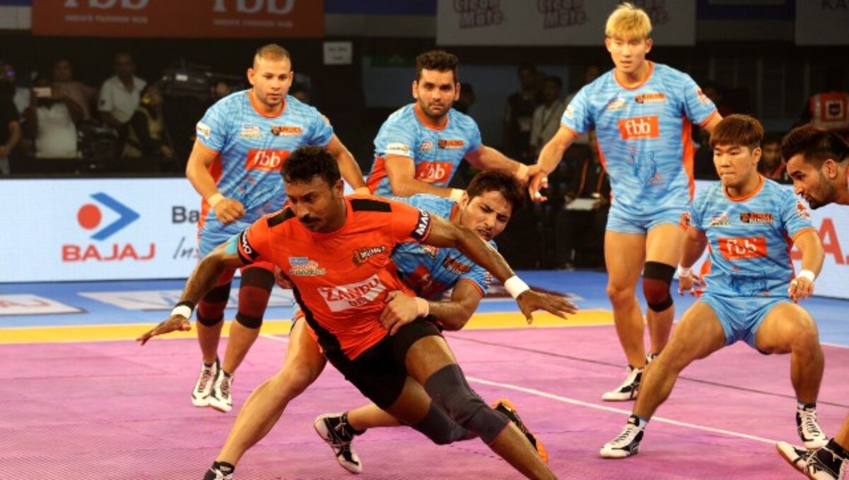 Players of UMumba celebrate after they won the Pro Kabaddi League