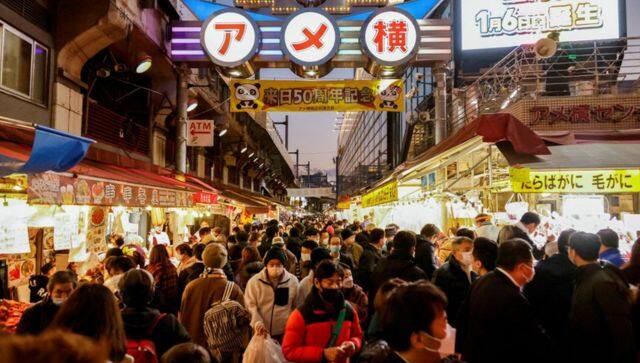 Japans population falls while foreign residents rise to record