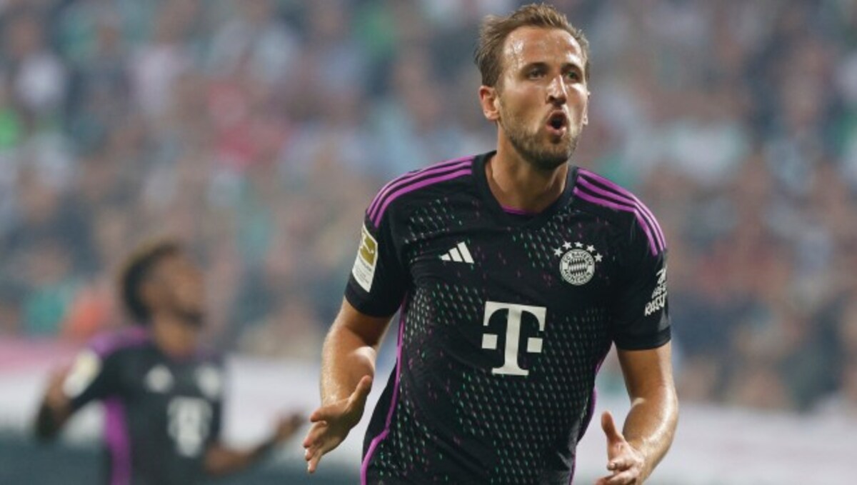 Harry Kane pictured in Bayern Munich shirt as he signs for German