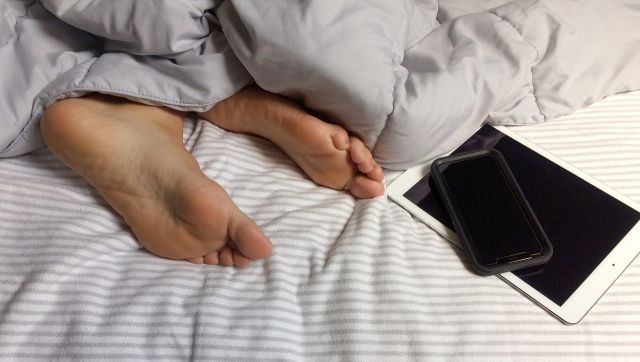 You shouldn't sleep with your cell phone at night. Here's why