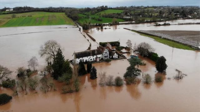 Swollen rivers cause major flooding in Britain as govt issues more than ...