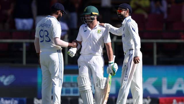 Virat Kohli bows down to Dean Elgar after his final Test knock