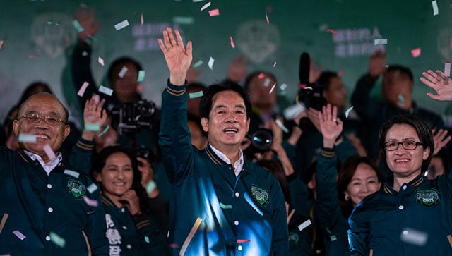 Taiwanese Vice President Lai Ching-te, also known as William Lai, left, celebrates his victory with running mate Bi-khim Hsiao in Taipei, Taiwan, on 13 January, 2024. AP