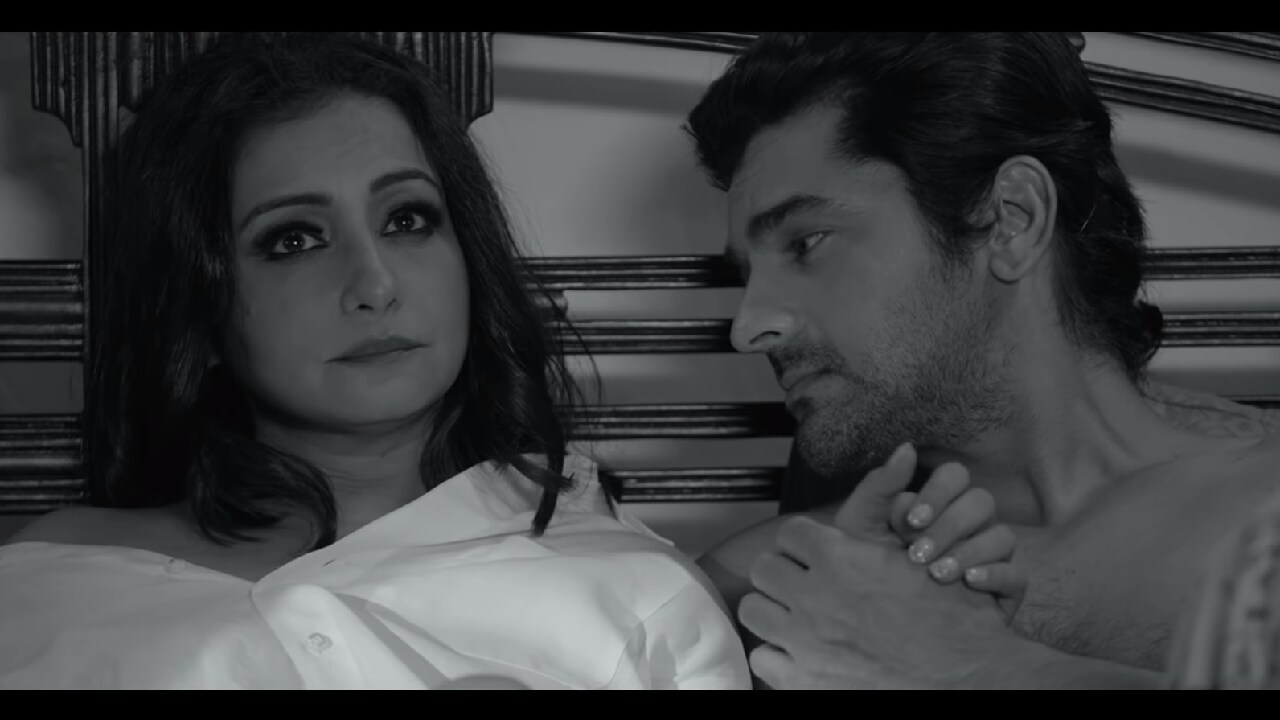 Divya Dutta and Arjan Bajwa discuss the future of their love in a still from The Playboy Mr Sawhney. YouTube screebgrab
