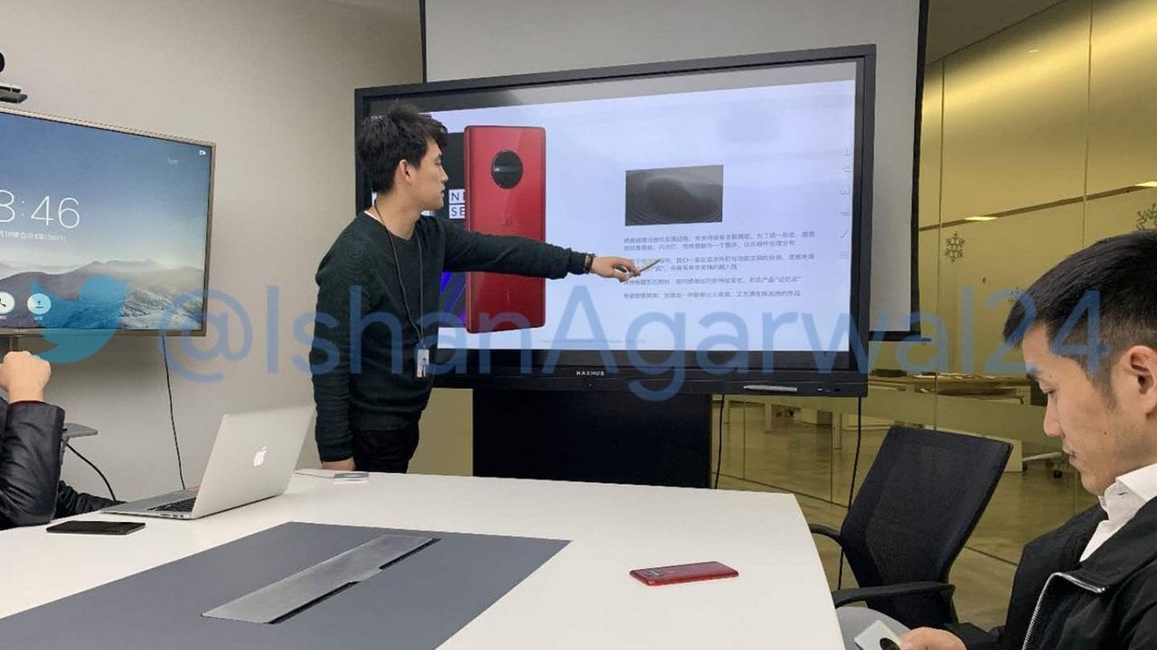 OnePlus CEO Petel Lau and an unknown OnePlus device. Ishan Agarwal