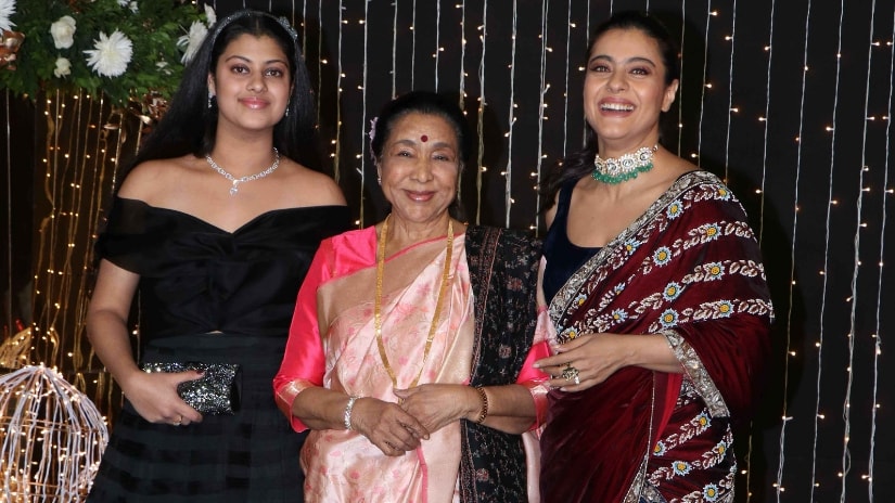 Kajol and Asha Bhonsle at NickYanka wedding reception. Firstpost/@Sachin Gokhale
