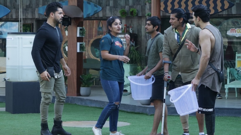 Contestants fight it out during BB Water Station task