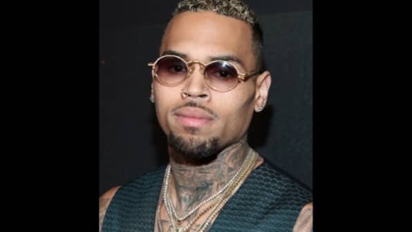 Chris Brown detained by Paris police after 24-year-old woman accuses singer of rape