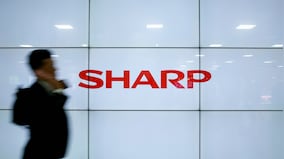 Sharp cut its full-year outlook, citing US-China trade frictions and weaker demand