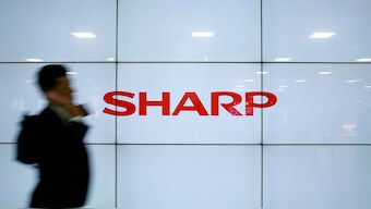 Sharp cut its full-year outlook, citing US-China trade frictions and weaker demand
