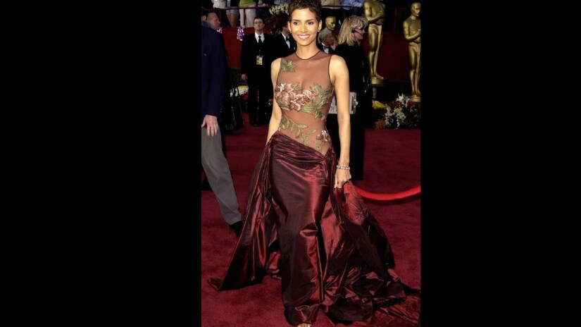 Halle Berry's mesh and silk dark red gown is one of the most memorable outfits in the history of Oscars