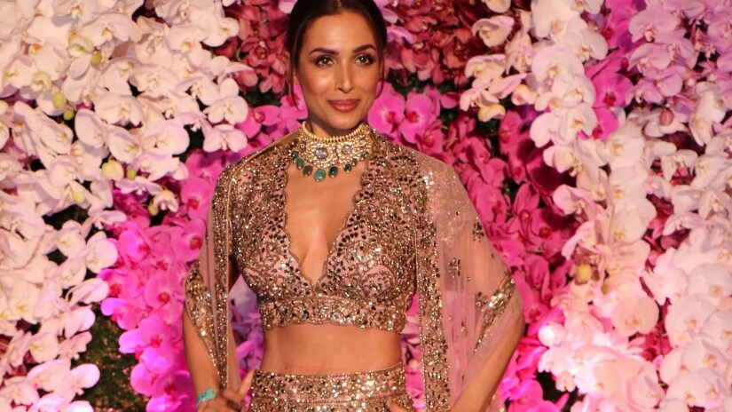 Malaika Arora in a resplendent shimmery lehenga at the venue. Firstpost/@Sachin Gokhale Malaika Arora in a resplendent shimmery lehenga at the venue. Firstpost/@Sachin Gokhale