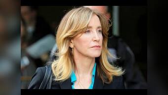 Felicity Huffman released two days before end of prison sentence for role in US college admissions scandal