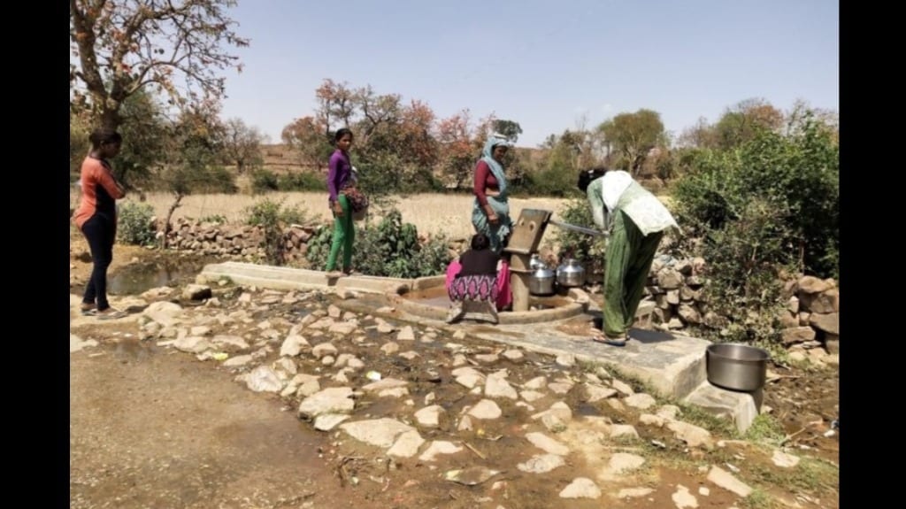 In most Bundelkhand villages, women make multiple trips in a day to a water pump kilometres away from their home. Photo by Kanchan Srivastava.