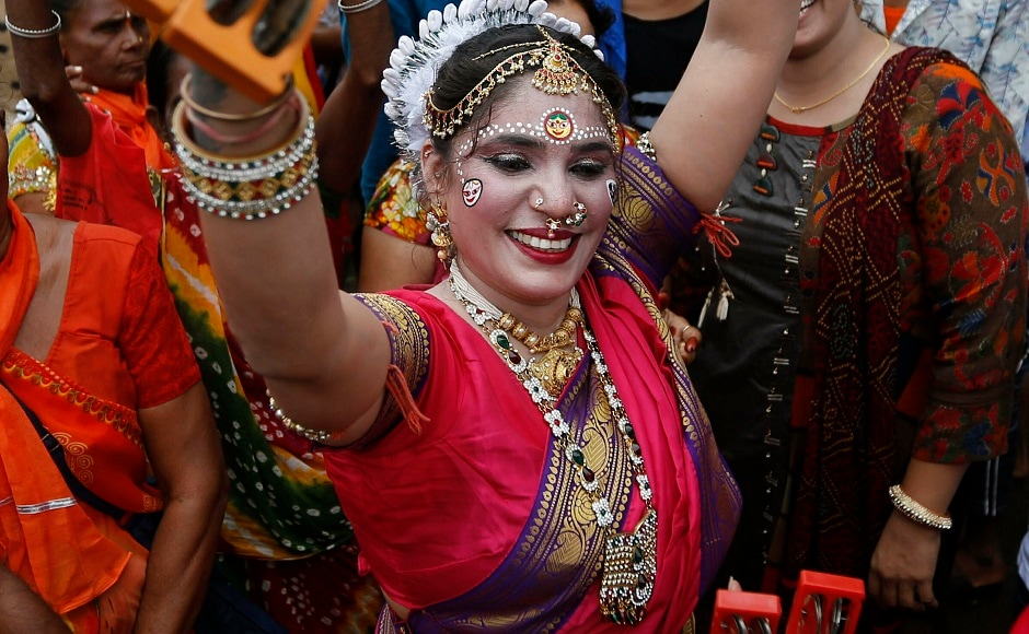 Hindu devotees dance during the 10-day procession in Odisha when the 3 deities take a journey to the temple of their 'aunt' Devi Gundecha. AP Hindu devotees dance during the 10-day procession in Odisha when the 3 deities take a journey to the temple of their 'aunt' Devi Gundecha. AP