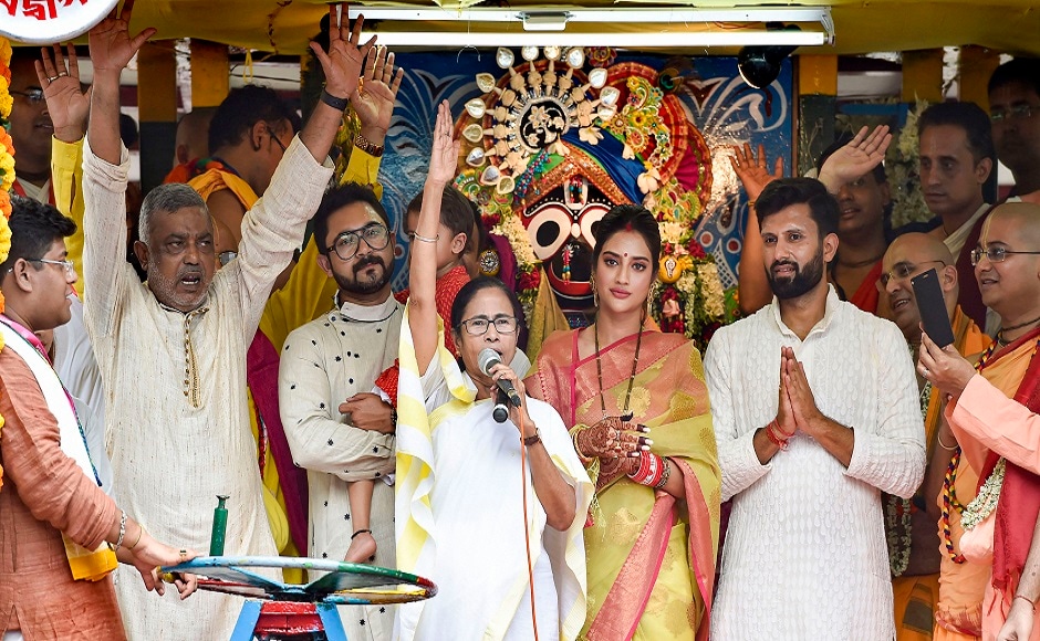 West Bengal chief minister Mamata Banerjee and newly-elected MP Nusrat Jahan attend the ISKCON Kolkata Rath Yatra. PTI West Bengal chief minister Mamata Banerjee and newly-elected MP Nusrat Jahan attend the ISKCON Kolkata Rath Yatra. PTI