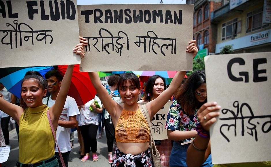 Participants hold up placards while taking part in a Gay Pride parade to mark pride month in Kathmandu, Nepal on 29 June, 2019. Reuters/Navesh Chitrakar Participants hold up placards while taking part in a Gay Pride parade to mark pride month in Kathmandu, Nepal on 29 June, 2019. Reuters/Navesh Chitrakar