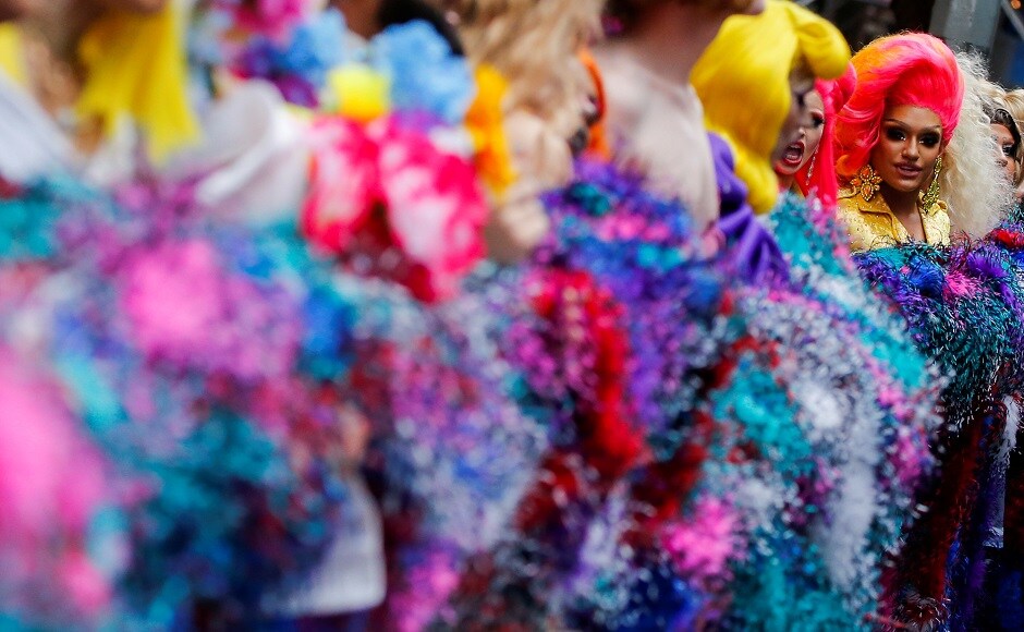 A Drag Queen helps to set a Guinness World Record for the longest feather boa at 1.2 miles, along 42 St, in Times Square in New York, US on 20 June, 2019. Reuters/Eduardo Munoz A Drag Queen helps to set a Guinness World Record for the longest feather boa at 1.2 miles, along 42 St, in Times Square in New York, US on 20 June, 2019. Reuters/Eduardo Munoz