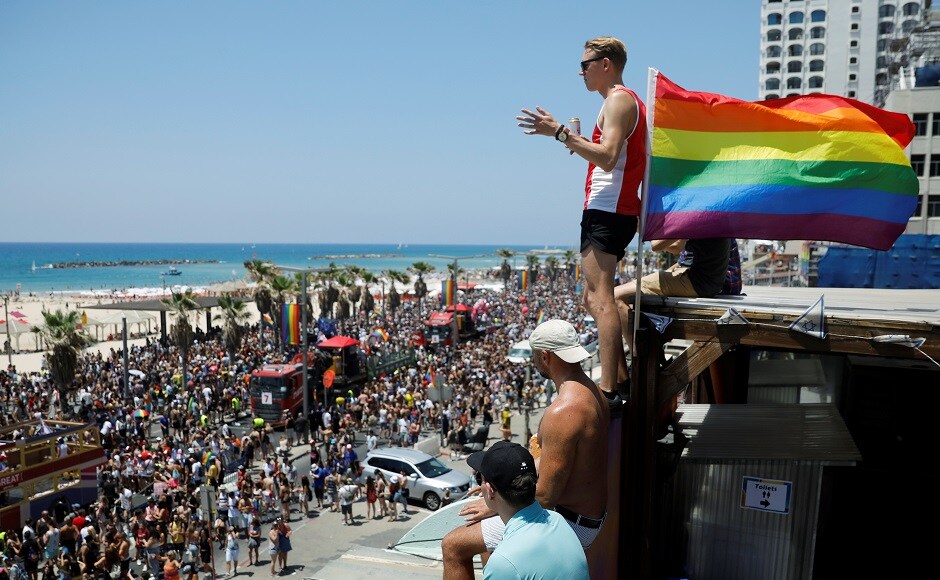 Revellers take part in an annual gay pride parade in Tel Aviv, Israel on 14 June, 2019. Reuters/Ronen Zvulun Revellers take part in an annual gay pride parade in Tel Aviv, Israel on 14 June, 2019. Reuters/Ronen Zvulun