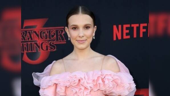 Stranger Things star Millie Bobby Brown turns producer with sister Paige for Netflix drama A Time Lost