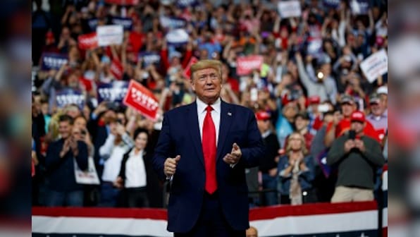 Donald Trump tries to turn impeachment probe into campaign asset during rally in Minneapolis; attacks rival Joe Biden, son Hunter