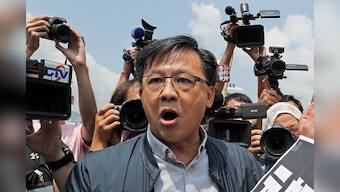 Hong Kong protests: Pro-Beijing lawmaker Junius Ho stabbed while campaigning, assailant arrested