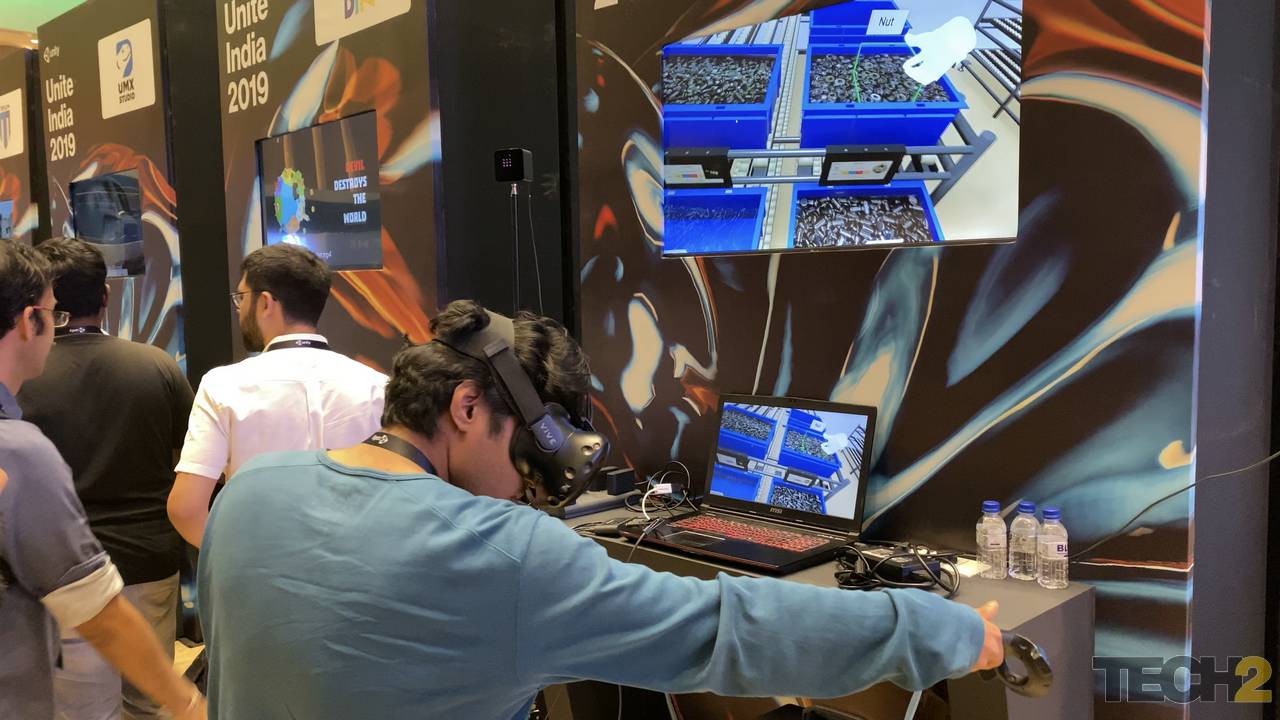 Using a VR headset to train auto shopfloor workers being demoed at Unite India 2019. Image: tech2