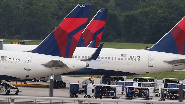 Woman punches, spits on elderly passenger in flight; watch viral video here